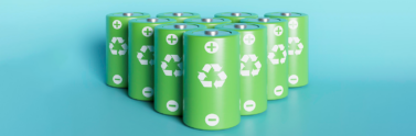 Set of green batteries with recycling signs lined up against blue background