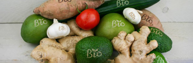 Assortment of fruits and vegetables with natural branding