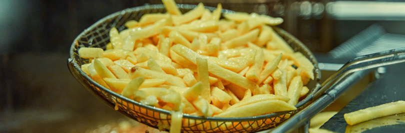 French-fries-being-lifted-out-of-fryer