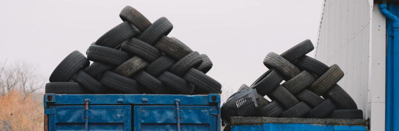 pile-of-vehicle-tires-in-dumpsters