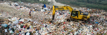 bulldozer moving landfill