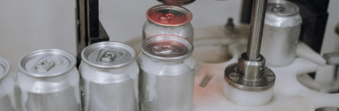 soda cans on a conveyor belt