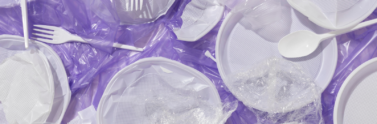 Plastic waste on a purple background