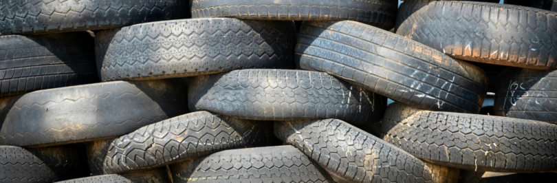 Pile of black car tires stacked