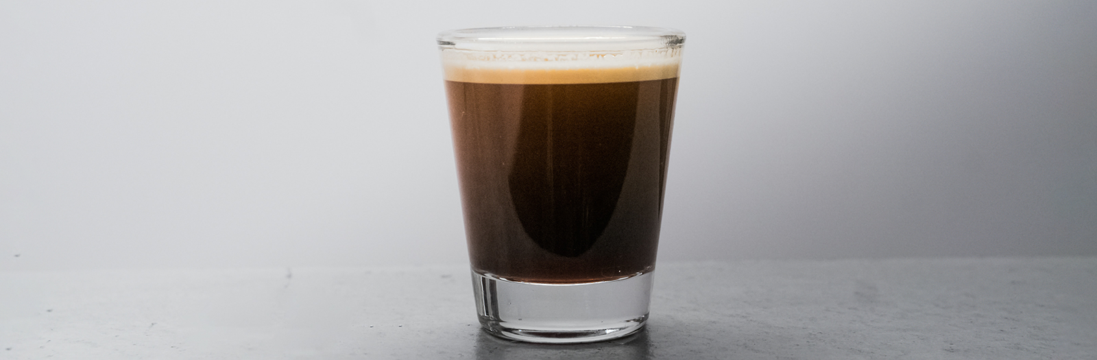 Coffee in clear reusable glass