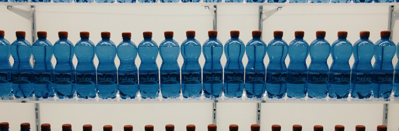 Assorted water bottles on shelf
