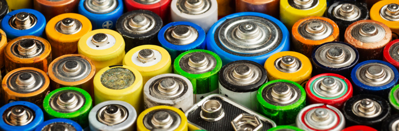 High view of multiple sizes of colourful batteries