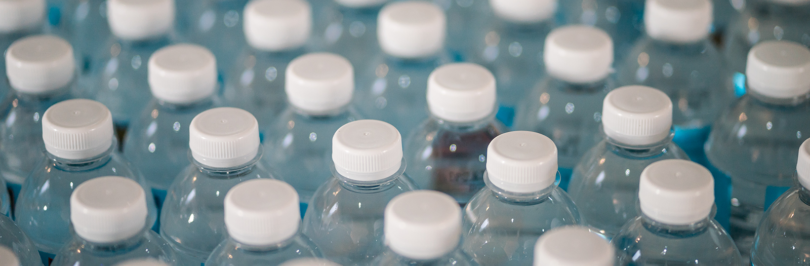 Plastic water bottles lined up