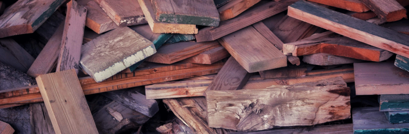 Pile of used wooden planks