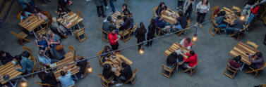 Birds eye view of people dining in mall food court