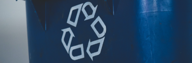 recycle symbol on blue bin