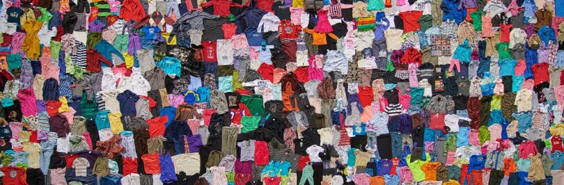 overhead photo of second hand clothing items