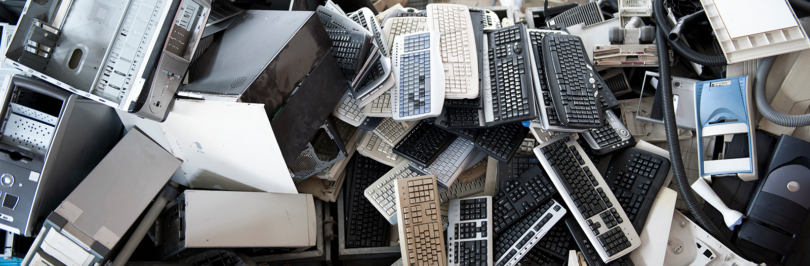 Assorted electronic waste in a pile